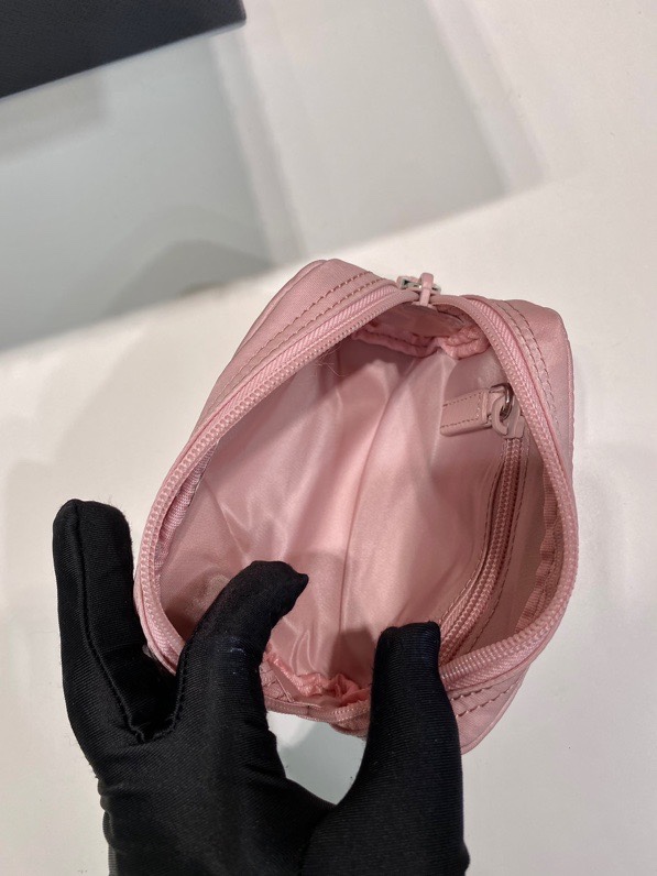 Pra*a clutch bags